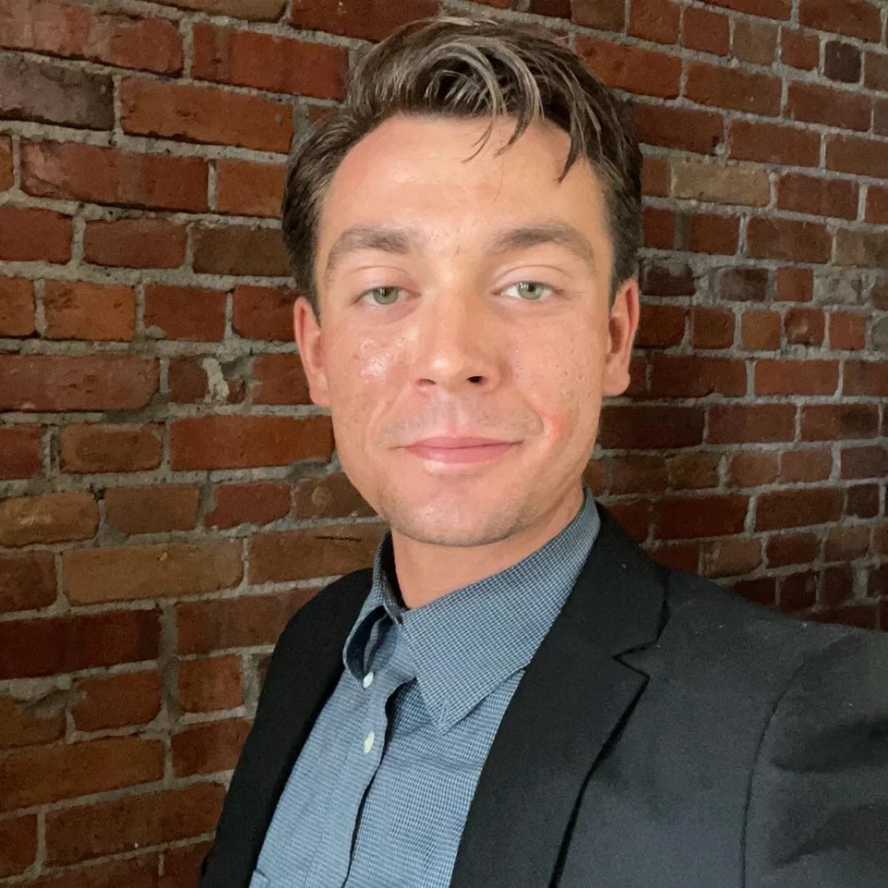 Professional portrait of Aaron Ladd, founder and CEO of bluewaterCODE