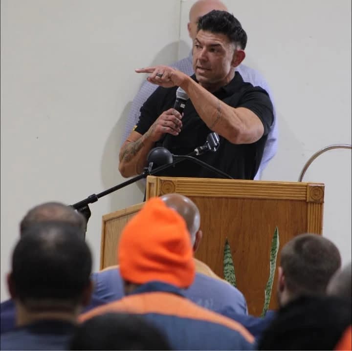 Jason Frontczak speaking at a lectern